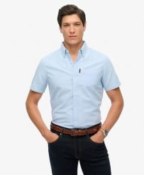 Superdry Oxford Short Sleeve Shirt – koszula Oxford krótki rękaw 100% bawełna. Niebieskie koszule Superdry, s, bez wzorów, z bawełny, casualowe, bez kołnierzyka, bez ramiączek. Za 276.70 zł.