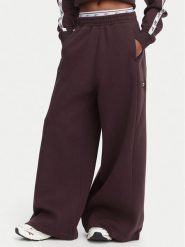 Reebok Spodnie dresowe Aleksandra RK25682CCW Brązowy ciemny Regular Fit. Brązowe spodnie dresowe Reebok, bez wzorów, z bawełny. Za 259.99 zł.