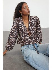 Trendyol Bluzka w kolorze jasnobrązowo-czarnym rozmiar: 34. Brązowe bluzki Trendyol, bez wzorów, bez kołnierzyka, bez ramiączek. Za 60.99 zł.