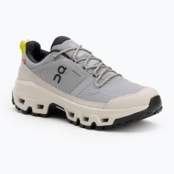 Buty damskie On Cloudrock Low Waterproof. Szare buty trekkingowe On, z gumy, bez zapięcia. Za 810.50 zł.