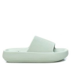 Sandały Xti 44489-AQUA dla kobiet. Białe sandały XTI, bez wzorów, z materiału, bez obcasa, bez zapięcia. Za 141.55 zł.