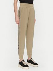 Guess Spodnie dresowe W5RB00 KBYE2 Zielony Regular Fit. Zielone spodnie dresowe Guess, z aplikacjami, z dresówki. Za 349.99 zł.