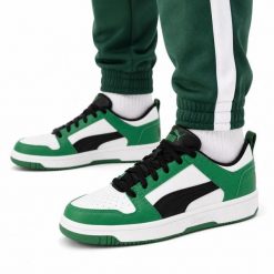 Buty sneakersy sportowe młodzieżowe Puma REBOUND LAYUP LO SL JR. Biała buty treningowe Puma, bez wzorów, z dresówki, bez zapięcia, trekkingowe. Za 169.00 zł.