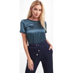 Bluzka Nupar WEEKEND MAX MARA. Zielone bluzki Weekend Max Mara, l, bez wzorów, z dzianiny, bez kołnierzyka, bez ramiączek. W wyprzedaży za 375.20 zł.