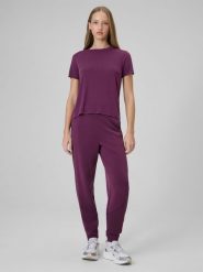 4F Spodnie dresowe z modalem joggery damskie - fioletowe XL. Czerwone spodnie sportowe 4f, bez wzorów, z dresówki. Za 189.99 zł.