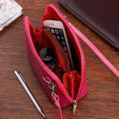 Vera Pelle Torebka Skórzana mała listonoszka fuksjowa K03. Torby na laptopa bez wzorów, z lakierowanej skóry, lakierowane. Za 109.99 zł.