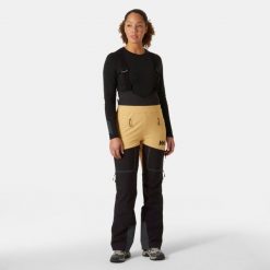 Damskie spodnie narciarskie na szelkach Helly Hansen Odin BC Softshell. Brązowe spodnie narciarskie Helly Hansen, bez wzorów, z softshellu, narciarskie. Za 1,535.50 zł.