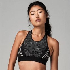 Stanik sportowy damski STRONG ID Make The Cut odblaskowy. Czarne biustonosze sportowe STRONG ID, bez wzorów, z materiału, na fitness i siłownię. Za 119.99 zł.