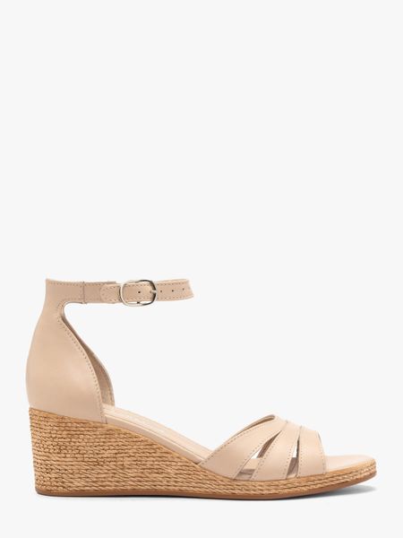 Beżowe sandały damskie. Brązowe sandały Ryłko, bez wzorów, ze skóry, klasyczne, bez obcasa, na koturnie, bez zapięcia. W wyprzedaży za 199.99 zł.