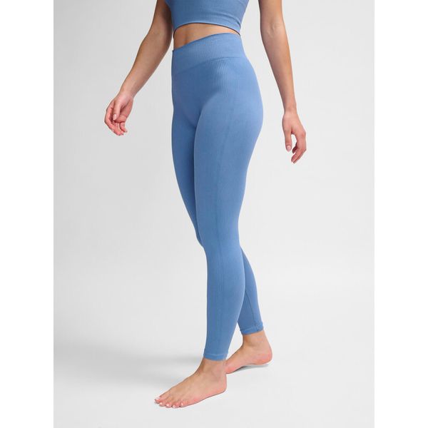 Damskie legginsy bezszwowe Hummel MT Adapt MW. Fioletowe legginsy Hummel, bez wzorów, sportowe. Za 170.00 zł.