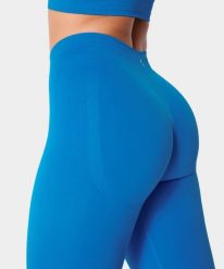Legginsy bezszwowe z push-up dla kobiet na siłownię Carpatree Eris. Niebieskie legginsy Carpatree, bez wzorów, z dzianiny. Za 175.99 zł.