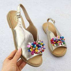 Sandały damskie z koralikami złote Filippo DS6230. Żółte sandały Filippo, bez wzorów, ze skóry ekologicznej, bez obcasa, bez zapięcia. Za 129.99 zł.