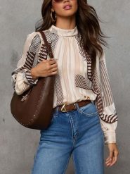 LA Angels Bluzka w kolorze biało-brązowym rozmiar: L. Białe bluzki LA Angels, l, bez wzorów, bez kołnierzyka, bez ramiączek. Za 158.10 zł.