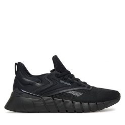 Buty na siłownię Reebok. Czarne buty treningowe Reebok, bez wzorów, bez zapięcia, na fitness i siłownię. Za 399.99 zł.