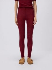 Wełniane legginsy - burgundowy. Czerwone legginsy Reserved, bez wzorów, z dzianiny. Za 179.99 zł.