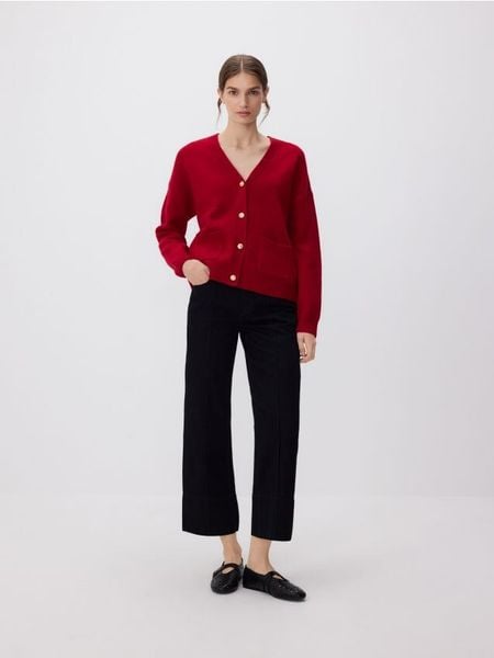 Wełniany kardigan - czerwony. Czerwone swetry Reserved, l, bez wzorów, z dzianiny, bez ramiączek. W wyprzedaży za 129.99 zł.