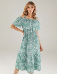 Lniana sukienka w białe kwiaty. Białe sukienki Unisono, l, bez wzorów, z tkaniny, bez kołnierzyka, bez ramiączek, mini. Za 249.00 zł.