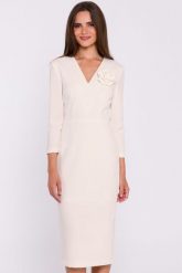 Elegancka sukienka ołówkowa z dekoltem V kremowa. Białe sukienki Stylove, na co dzień, m, bez wzorów, z elastanu, eleganckie, bez kołnierzyka, bez ramiączek, midi, dopasowane. Za 449.00 zł.