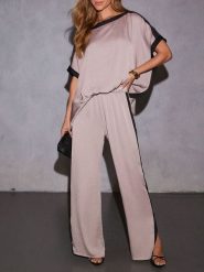 Milan Kiss Spodnie w kolorze szarobrązowo-czarnym rozmiar: L. Brązowe spodnie materiałowe Milan Kiss, bez wzorów, z materiału, z podwyższonym stanem. Za 130.99 zł.