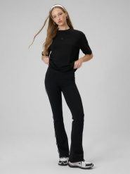 4F Legginsy z rozszerzanymi nogawkami damskie - czarne XS. Czarne legginsy 4f, bez wzorów, z bawełny. Za 129.99 zł.