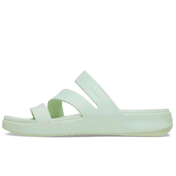 Klapki Crocs Getaway Strappy W Damskie. Zielone klapki Crocs, bez wzorów, z materiału, bez obcasa, na koturnie, bez zapięcia. Za 171.40 zł.