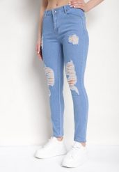 Niebieskie Dopasowane Jeansy Push-Up z Przetarciami i Regularnym Stanem Delosia. Niebieskie jeansy Born2be, l, bez wzorów, z denimu, biznesowe. Za 89.99 zł.