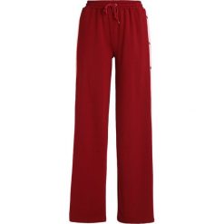 Missguided POPPER WIDE LEG JOGGER Spodnie treningowe burg/pink. Spodnie dresowe Missguided. Za 169.00 zł.