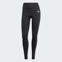 Długie legginsy Optimé Essentials Stash Pocket. Czarne legginsy adidas, bez wzorów, z elastanu, długie. Za 199.00 zł.