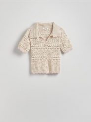 Ażurowy sweter - złamana biel. Swetry Reserved, l, w ażurowe wzory, z bawełny, bez ramiączek. W wyprzedaży za 89.99 zł.