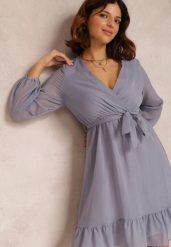 Niebieska Sukienka Iphina. Niebieskie sukienki Renee, m, z aplikacjami, z materiału, eleganckie, bez kołnierzyka, bez ramiączek, mini, kopertowe. W wyprzedaży za 83.99 zł.