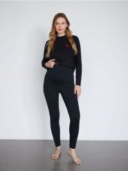 Bawełniane legginsy z wysokim stanem - czarny. Czarne legginsy Reserved, bez wzorów, z bawełny, klasyczne. Za 89.99 zł.