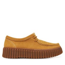 Półbuty Clarks. Żółte półbuty wsuwane Clarks, bez wzorów, bez obcasa, na płaskiej podeszwie. Za 429.99 zł.