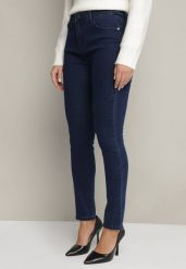 Granatowe Jeansy o Fasonie Slim z Regularnym Stanem Zelzedis. Niebieskie jeansy Born2be, bez wzorów, z bawełny, eleganckie. Za 99.99 zł.