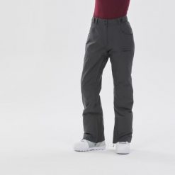 Spodnie snowboardowe damskie Dreamscape SNB 500. Szare spodnie narciarskie DREAMSCAPE, bez wzorów, z materiału, narciarskie. W wyprzedaży za 249.99 zł.