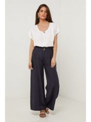 Lin Passion Lniane spodnie w kolorze granatowym rozmiar: 38/40. Niebieskie spodnie materiałowe Lin Passion, bez wzorów, ze lnu, klasyczne, z standardowym stanem. Za 130.99 zł.