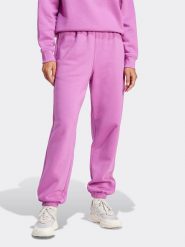Adidas Spodnie dresowe w kolorze fioletowym rozmiar: L. Różowe spodnie dresowe adidas, bez wzorów, z dresówki. Za 158.84 zł.