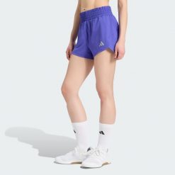 Szorty Racer Pacer z tkaniny plecionej. Fioletowe szorty sportowe adidas, bez wzorów, z elastanu, z podwyższonym stanem, na fitness i siłownię, climacool (adidas). Za 179.00 zł.