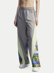 Adidas by Stella McCartney Spodnie dresowe Stella McCartney Earth Collage JG5794 Szary Loose Fit. Szare spodnie dresowe adidas by Stella McCartney, bez wzorów, z dresówki. Za 479.99 zł.