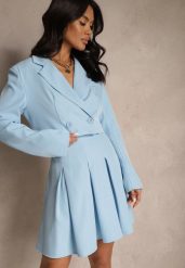 Niebieska Plisowana Spódnica High Waist o Rozkloszowanym Kroju Redilsa. Niebieskie spódnice Renee, na spotkanie biznesowe, l, bez wzorów, eleganckie, mini, plisowane. W wyprzedaży za 67.99 zł.