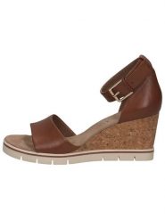 Caprice Skórzane sandały w kolorze jasnobrązowym na koturnie rozmiar: 39. Brązowe sandały Caprice, bez wzorów, z otwartym noskiem, bez obcasa, na koturnie, bez zapięcia. Za 117.17 zł.