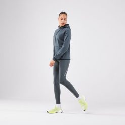 Legginsy do biegania damskie Kiprun Run 500 Warm ocieplane. Zielone legginsy KIPRUN, bez wzorów, z elastanu, sportowe. Za 139.99 zł.