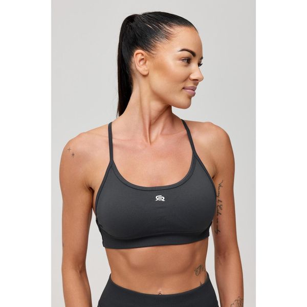 Stanik sportowy bezszwowy Rough Radical Seamless Glow Bra. Szare biustonosze sportowe ROUGH RADICAL, bez wzorów, na jogę i pilates. Za 129.90 zł.