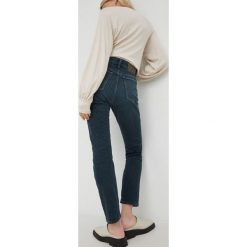 G-Star Raw jeansy damskie high waist. Niebieskie jeansy G-Star Raw, bez wzorów, z jeansu, retro, z podwyższonym stanem. W wyprzedaży za 460.99 zł.