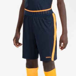 Spodenki do piłki nożnej dla dzieci Kipsta CLR. Brązowe szorty KIPSTA, bez wzorów, z elastanu, sportowe. Za 54.99 zł.