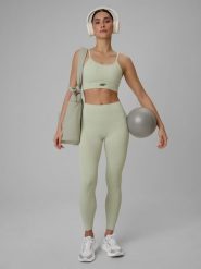 4F Legginsy treningowe bezszwowe damskie - zielone XS/S. Zielone legginsy 4f, bez wzorów, ze skóry, długie. Za 149.99 zł.