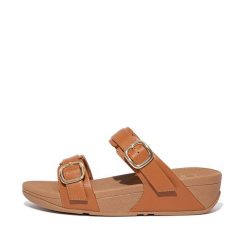 Kobiece klapki na koturnie FitFlop Lulu. Brązowe klapki FIT FLOP, bez wzorów, eleganckie, bez obcasa, na koturnie, bez zapięcia. Za 565.50 zł.