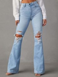 Tazga Dżinsy - Flare fit - w kolorze błękitnym rozmiar: 36. Niebieskie jeansy Tazga, z aplikacjami, ze skóry, klasyczne, z podwyższonym stanem. Za 170.42 zł.