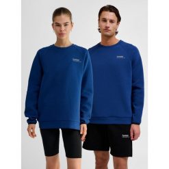 Bluza Hummel Tech. Niebieskie bluzy Hummel, na zimę, bez wzorów, z bawełny, klasyczne, bez ramiączek, bez kaptura. Za 286.50 zł.