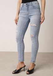 Niebieskie Bawełniane Jeansy o Kroju Slim z Przetarciami Elledima. Niebieskie jeansy Born2be, bez wzorów, z bawełny, eleganckie. Za 99.99 zł.