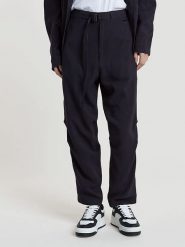 G-Star Spodnie w kolorze granatowym rozmiar: W30. Niebieskie spodnie materiałowe G-Star, bez wzorów, z materiału, retro. Za 252.99 zł.